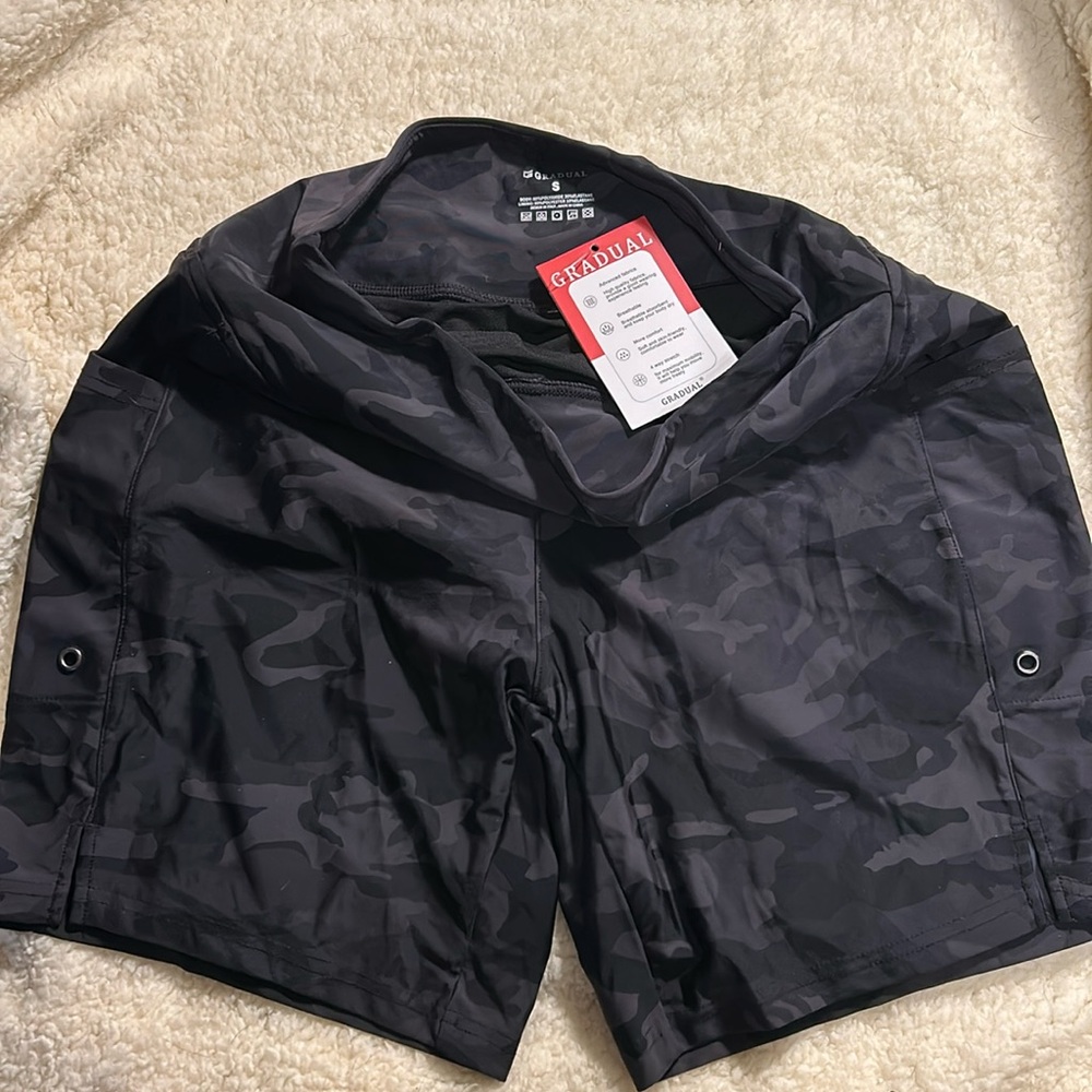 Swim shorts, black/gray camo, side pockets, size S.